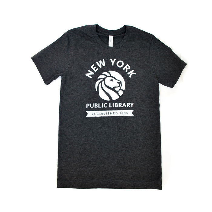 A charcoal black crew neck t-shirt with the New York Public Library logo printed in the center. Text reads: New York Public Library. Established 1895.