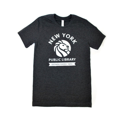 A charcoal black crew neck t-shirt with the New York Public Library logo printed in the center. Text reads: New York Public Library. Established 1895.