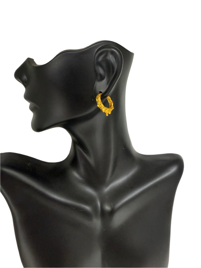 Sophisticated goldplated hoop earrings with Nepali-inspired pattern