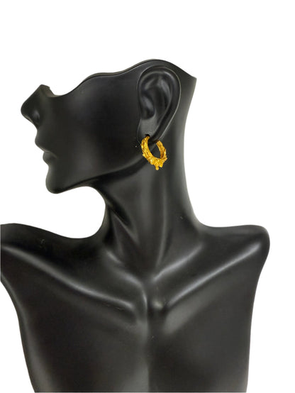 Sophisticated goldplated hoop earrings with Nepali-inspired pattern