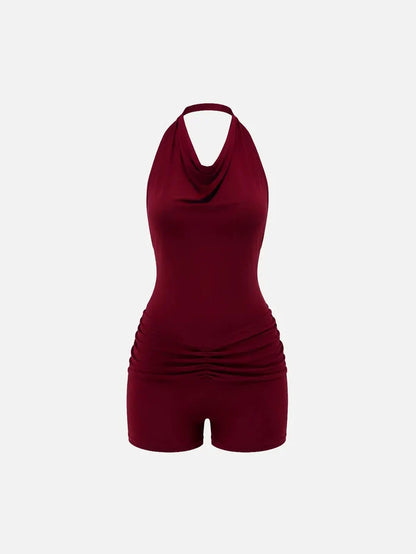 SLOWBURN Jenny Jumpsuit – burgundy, önden görünüm; halter yaka ve drapeli göğüs, büzgülü bel.
