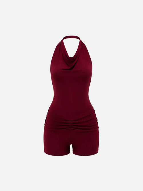 SLOWBURN Jenny Jumpsuit – burgundy, önden görünüm; halter yaka ve drapeli göğüs, büzgülü bel.