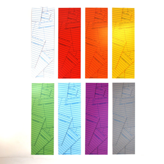A collection of colorful paper bookmarks with a library card pattern printed on them in the back.